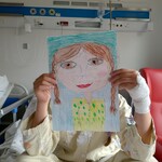 Portret dziecka z warkoczami