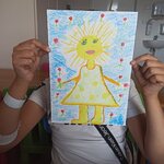 Postać Lata z głową w kształcie słońca