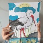 Portret bociana w wodzie