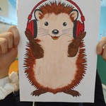 Portret jeża w słuchawkach