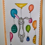 Kartka wielkanocna z zajączkiem z balonami