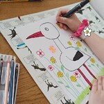 bocian na łące